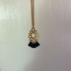 I’m selling a gold black necklace